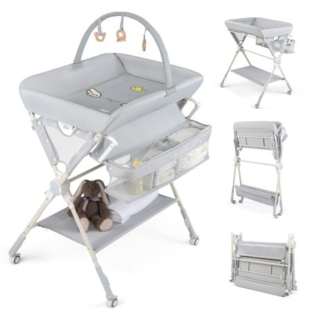 Cambiador bebé plegable 3 en 1 en color gris con altura ajustable, ruedas y almacenamiento para pañales y juguetes.